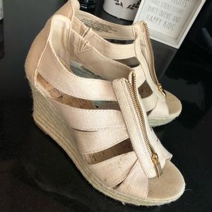 Tan wedge with gold zipper front